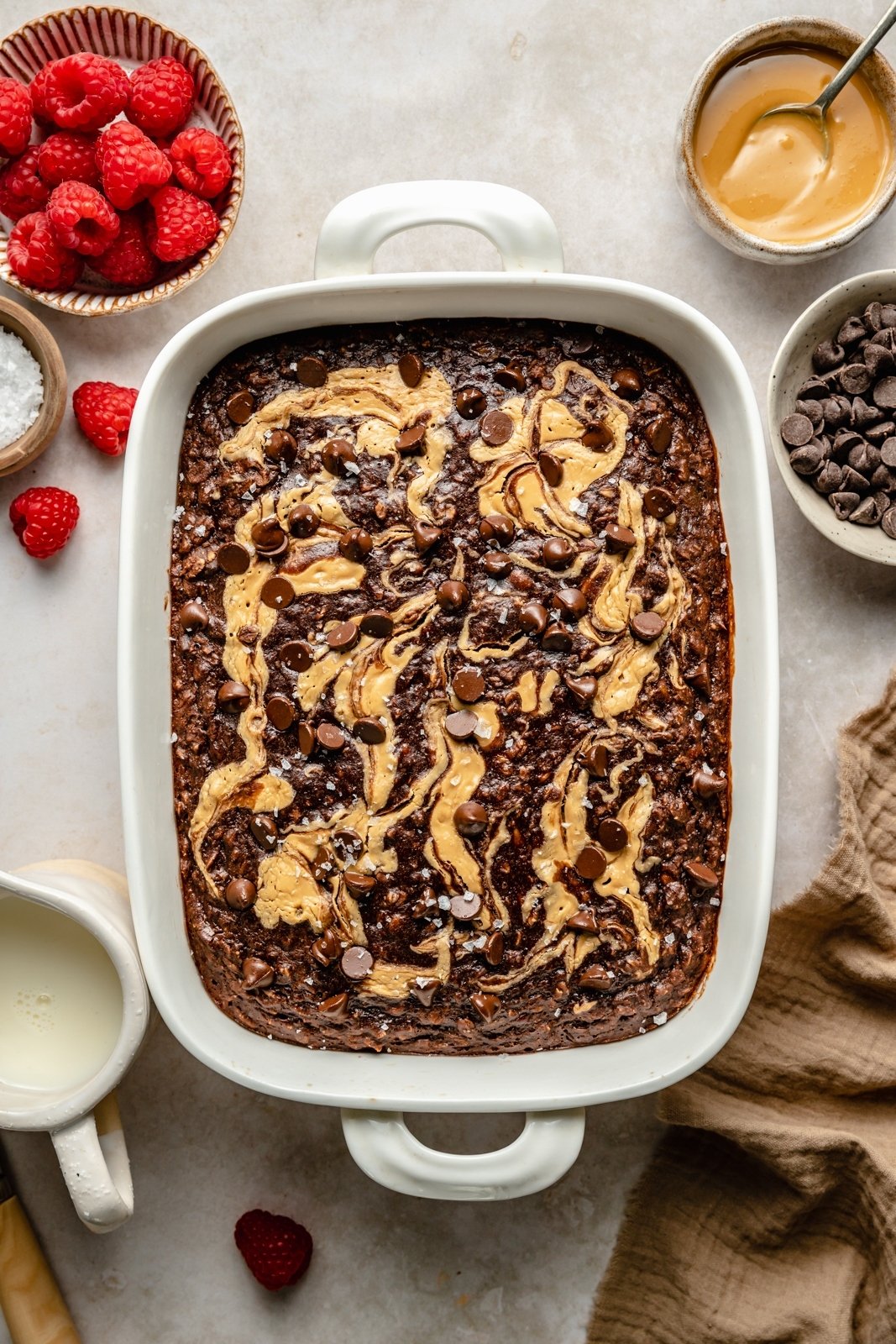 chocolate peanut butter banana baked oatmeal in a baking dish