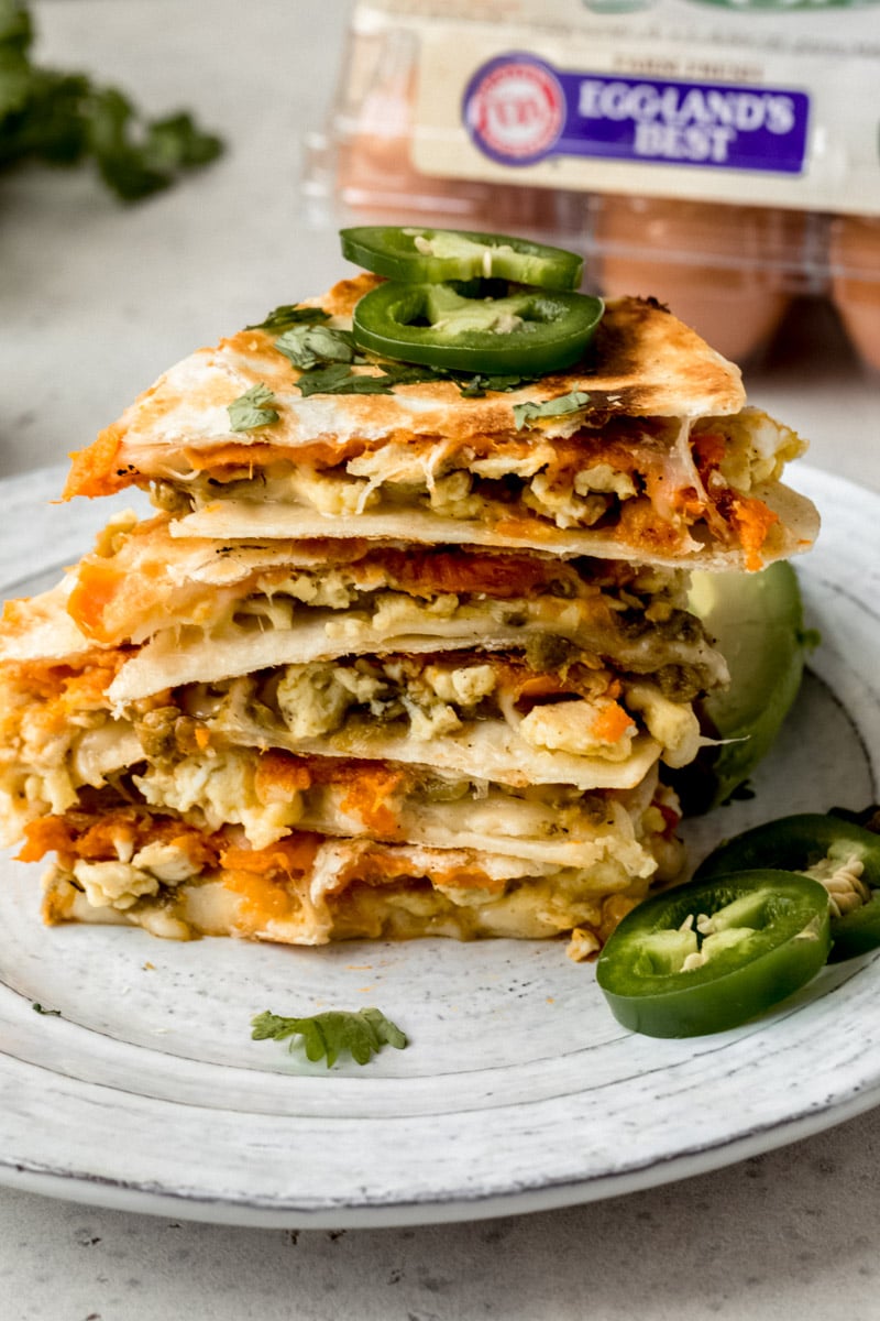 breakfast quesadillas in a stack on a plate